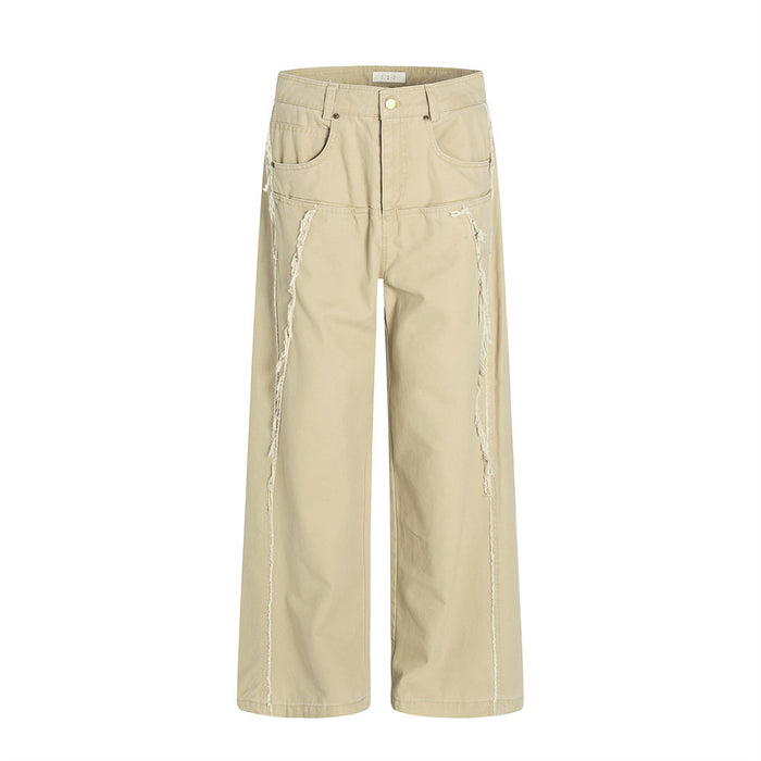 Front view of beige wide-leg pants with frayed seam details and five-pocket design