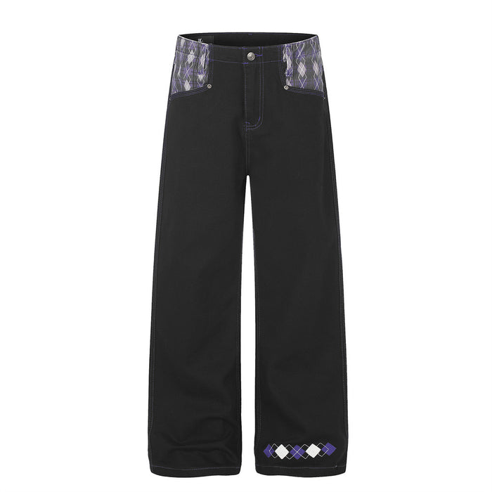 Black wide-leg jeans with argyle patchwork waistband and embroidered hem detail, front view