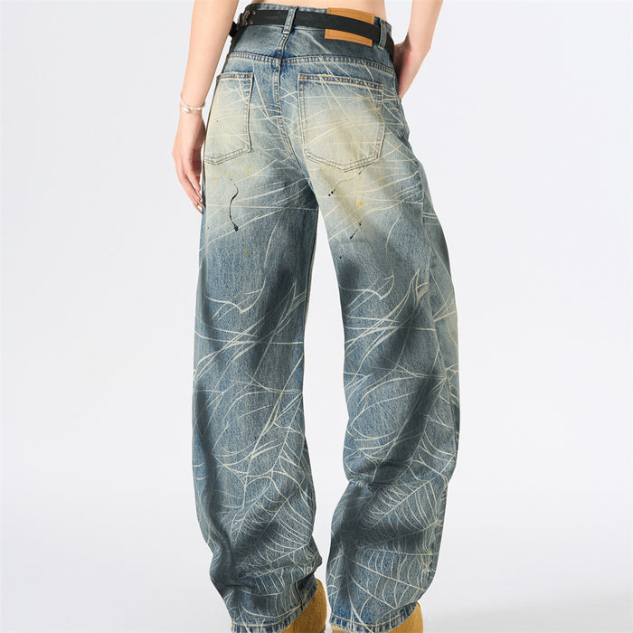 Back view of wide-leg blue jeans with distressed scratch print and belt loops