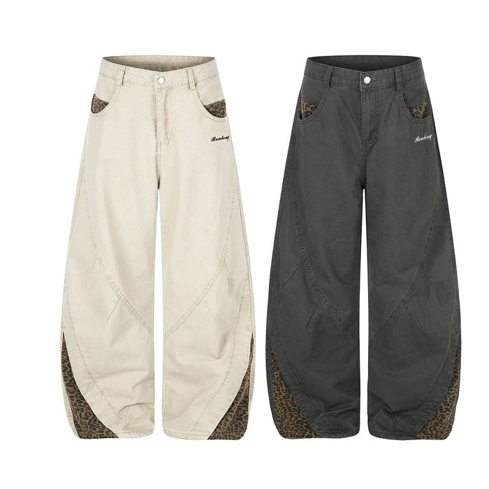 Wide-leg pants shown front in beige and charcoal, with leopard-print pocket and lower-leg panels