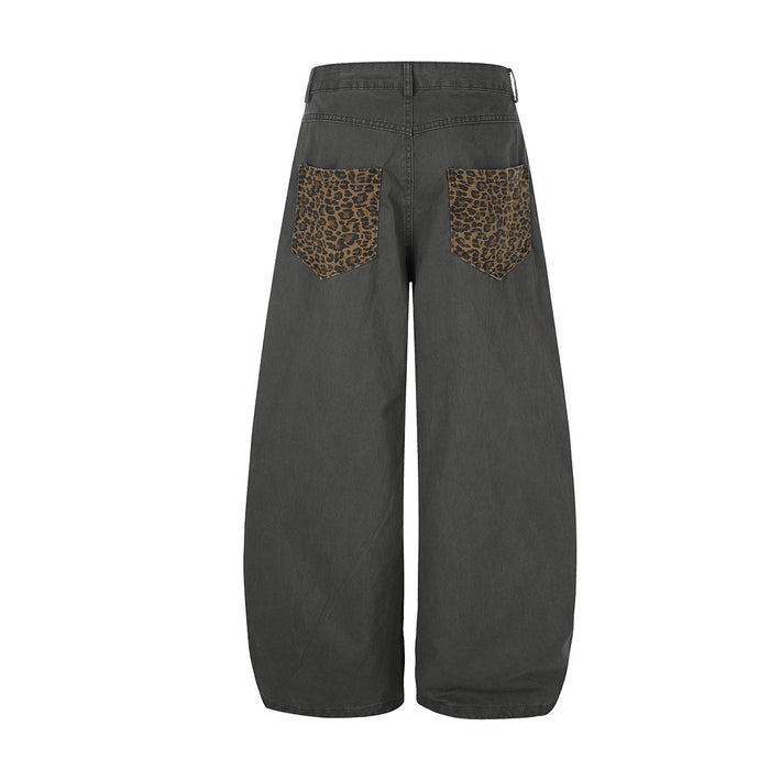 Back view of charcoal wide-leg pants featuring two leopard-print back pockets