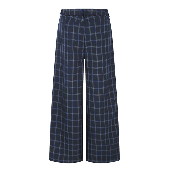 Back view of navy plaid wide-leg trousers with an elastic waistband
