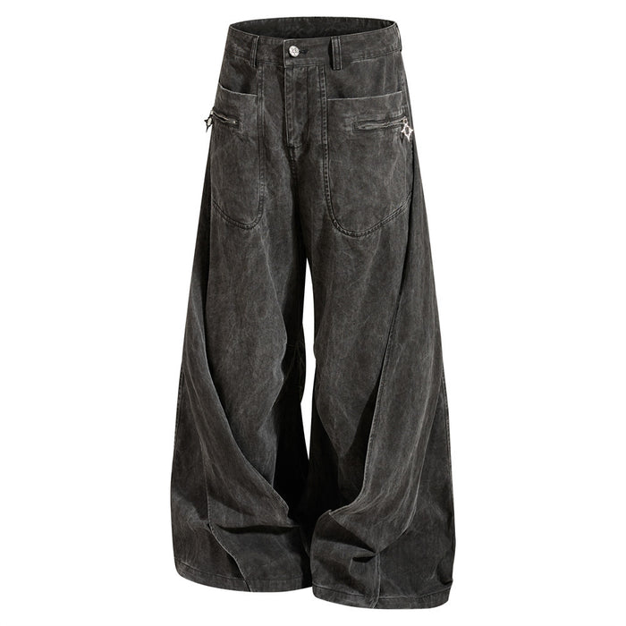 Black wide-leg acid wash pants front view with pleated drape and zip pockets