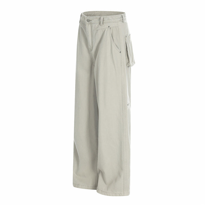 Beige wide-leg utility trousers in front side view with flap pocket and relaxed fit