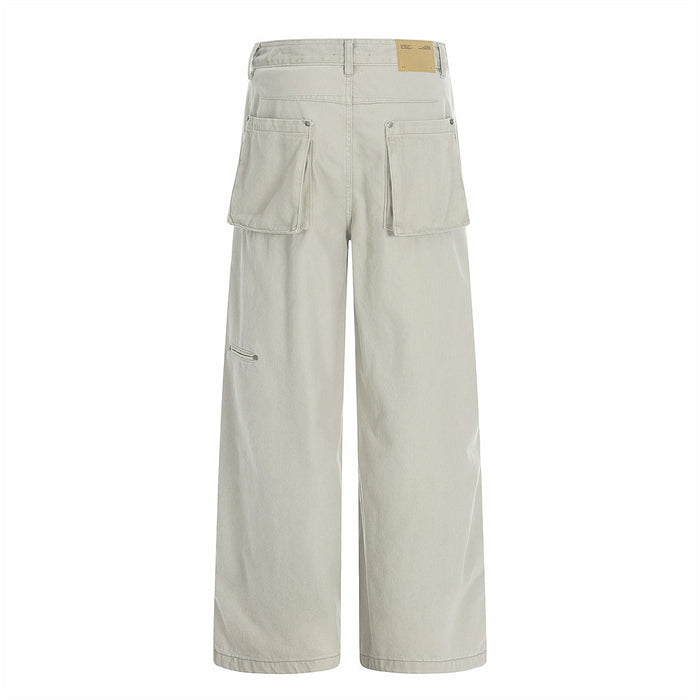 Beige utility trousers back view with large flap pockets and wide straight legs