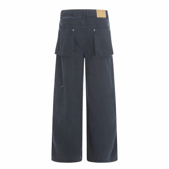 Navy utility trousers back view with flap pockets and wide straight legs
