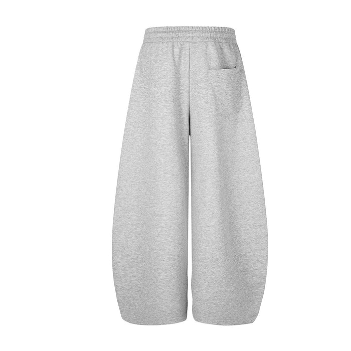 Back view of heather gray wide-leg sweatpants showing the elastic waistband and rear patch pocket
