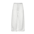 Wide leg studded sweatpants in heather gray with curved rhinestone stud detailing on front legs and elastic drawstring waist