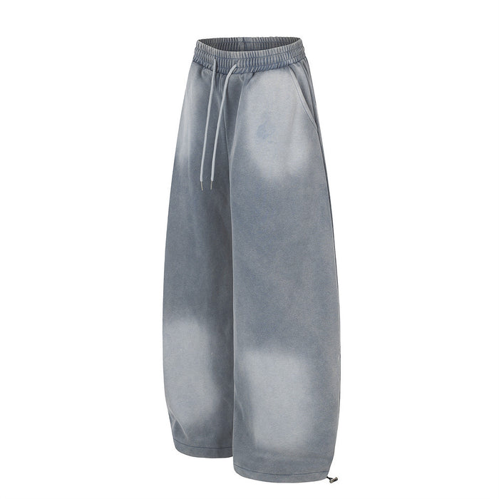 Gray acid wash wide-leg sweatpants front view with drawstring waist and oversized legs
