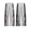 Heather gray wide-leg sweatpants shown front and back with black leopard-print side panels and pink graphic accents