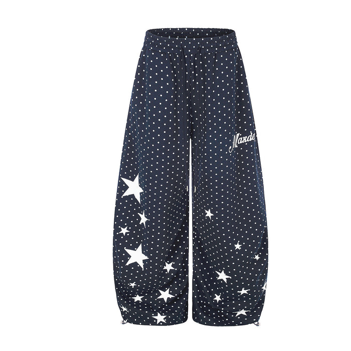Wide-leg polka dot and star print sweatpants with drawstring waist in navy blue