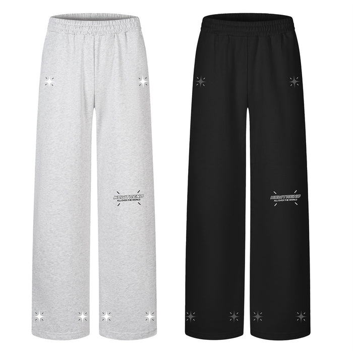 Wide-leg sweatpants in light gray and black, front views with star graphics and leg text
