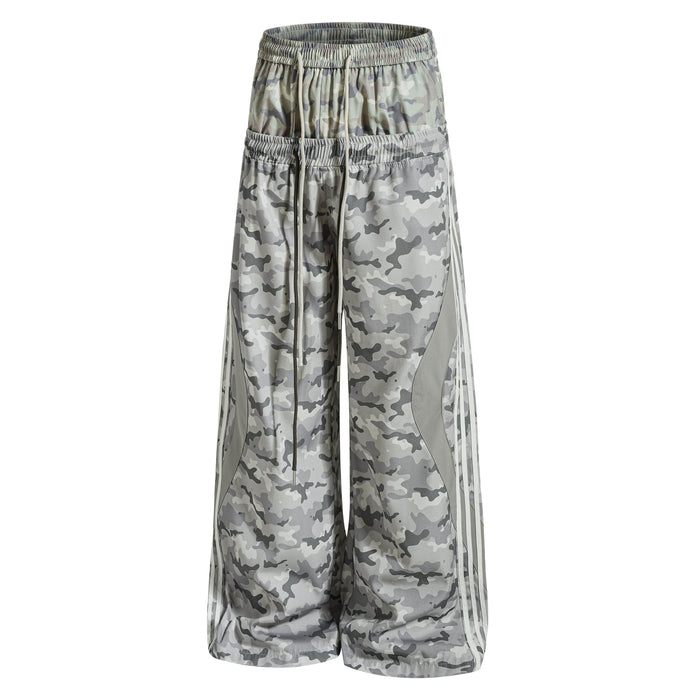 Wide-leg gray camouflage mesh track pants with side stripes, front view