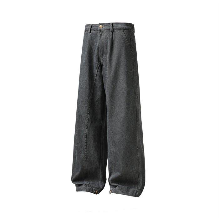 Three-quarter front view of relaxed gray denim trousers with very wide legs