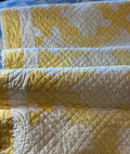 Yellow and White Drunkards Path Crib Quilt