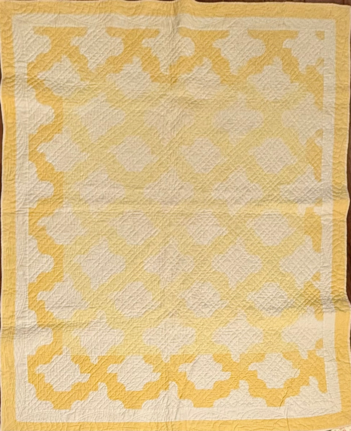 Yellow and White Drunkards Path Crib Quilt
