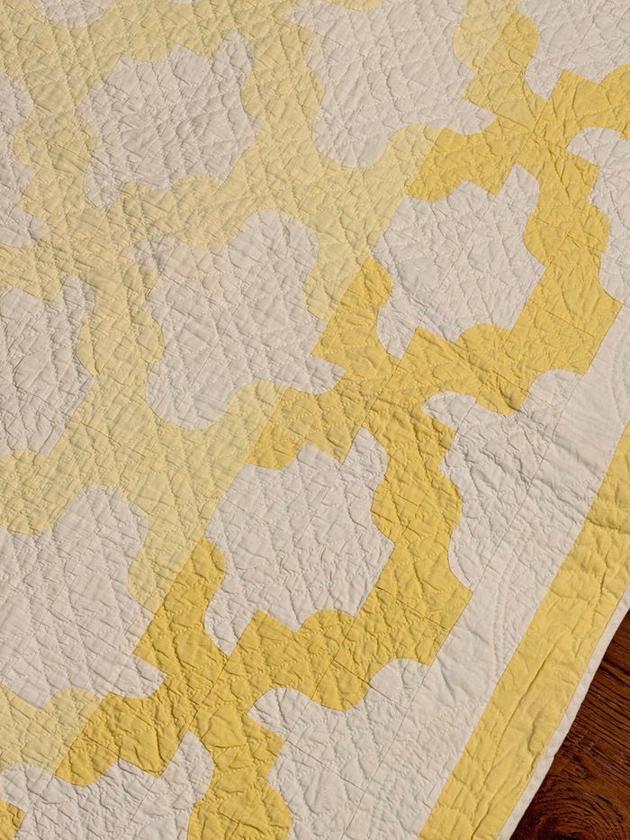 Yellow and White Drunkards Path Crib Quilt