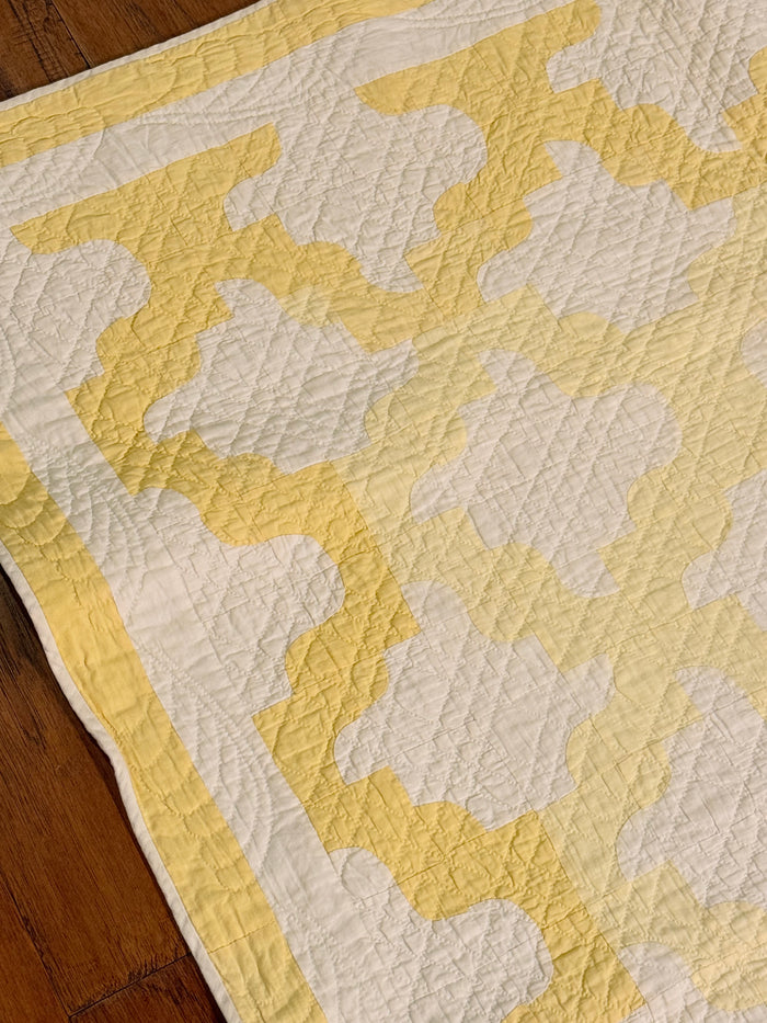 Yellow and White Drunkards Path Crib Quilt