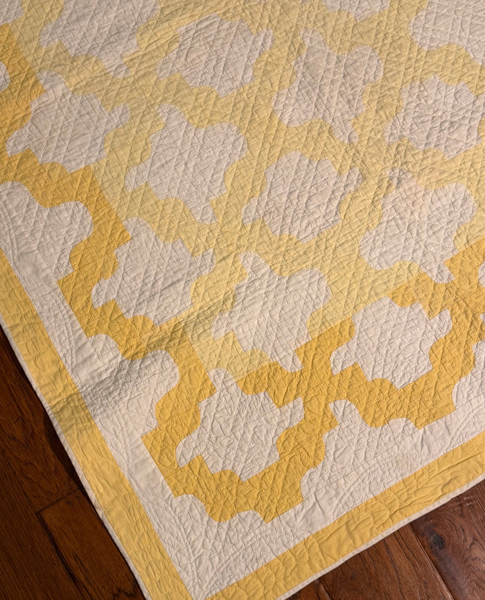 Yellow and White Drunkards Path Crib Quilt