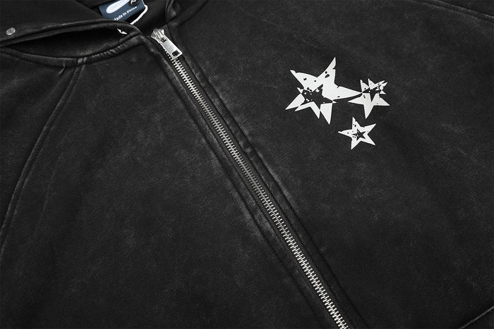Close-up of the hoodie front showing a silver zipper and white star graphic on the chest
