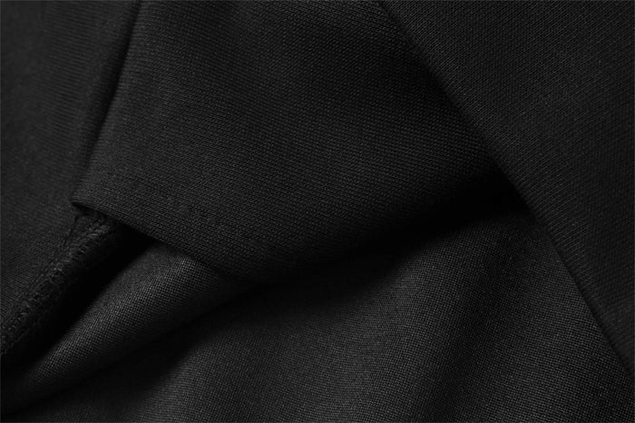 Close-up of black hoodie fabric and seam detail